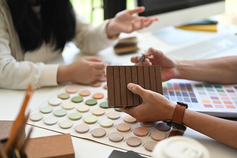 interior-designer-helping-client-choosing-colors-a-2024-12-05-19-05-11-utc